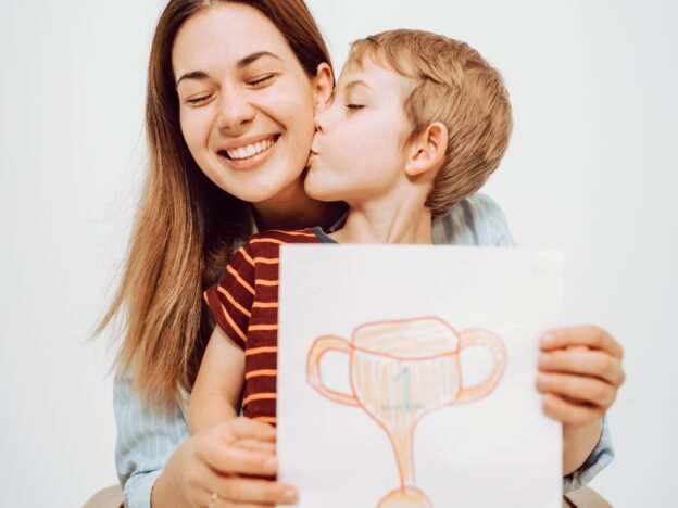 Kid is feeling proud of his painting